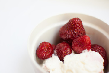 strawberries with ice cream in sundae