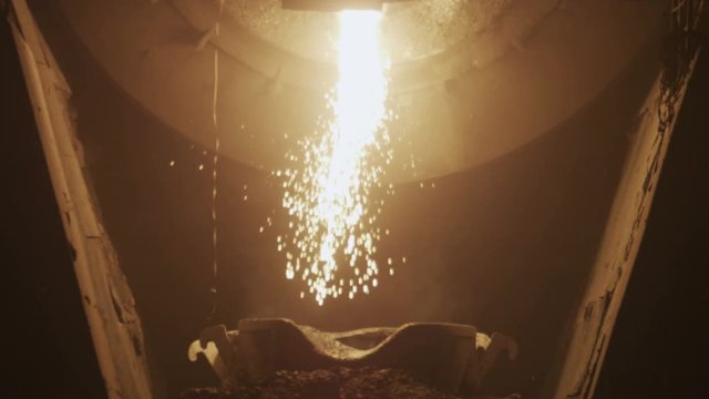 Molten metal melted in furnace at metallurgical plant