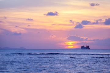 Naklejka na ściany i meble Beautiful tropical beach sunset with golden lights background,Koh Samui Thailand