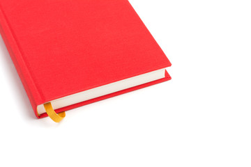 Red book with yellow bookmark isolated on a white background