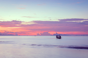 Panoramic beaytiful tropical  purple sea sky sunset with golden light background ,long exposure