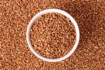 raw buckwheat on a colored background.