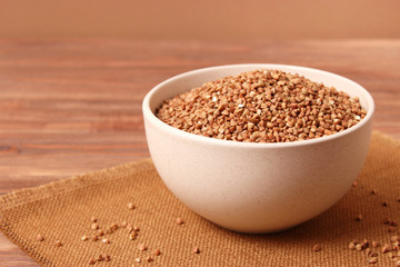 raw buckwheat on a colored background.