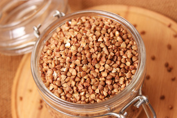 raw buckwheat on a colored background.