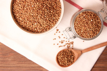 raw buckwheat on a colored background.