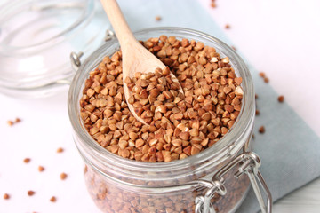 raw buckwheat on a colored background.