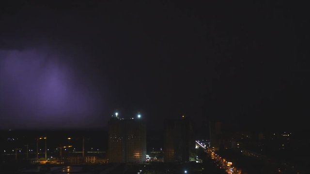 The bright lightning on the city background. night time