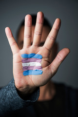 transgender flag in the palm of the hand