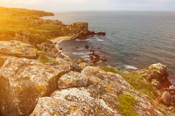 Picturesque scenery of the sea rocky coast and secluded sandy beaches