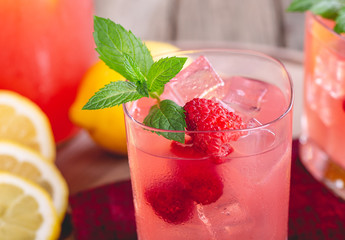 Glass of Raspberry Lemonade With Fresh Berries