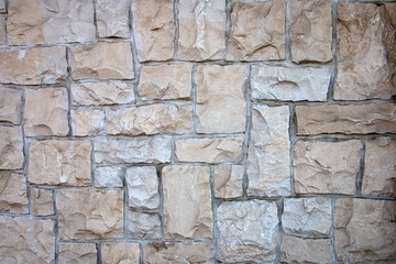 Light beige natural stone wall