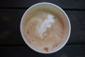 Cup of coffee with cinnamon