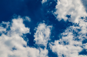 Beautiful fluffy clouds against the blue sky