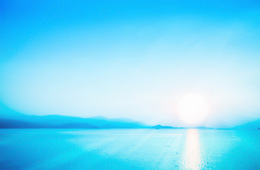 Fototapeta na wymiar soft focus blue sea and sunrise abstract spring,summer nature wallpaper background