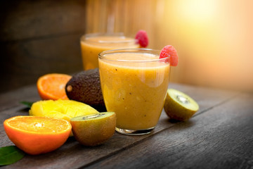 Fototapeta na wymiar Smoothie made with tropical fruit - refreshing drink 