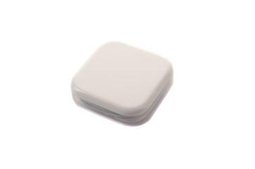 White headphones with headset lie on white isolated background.