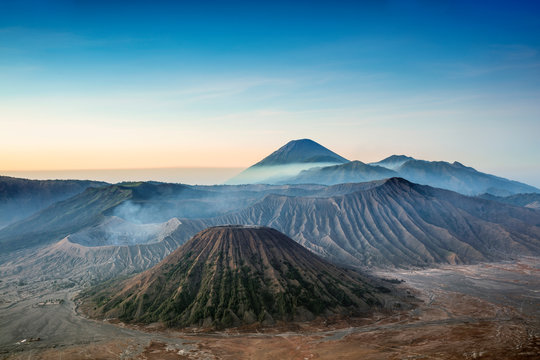 View over volcanic peaks and lava landscapes around Mount Bromo at dawn, Java, Indonesia