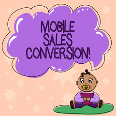 Word writing text Mobile Sales Conversion. Business concept for Any desired action that you want the user to take Baby Sitting on Rug with Pacifier Book and Blank Color Cloud Speech Bubble