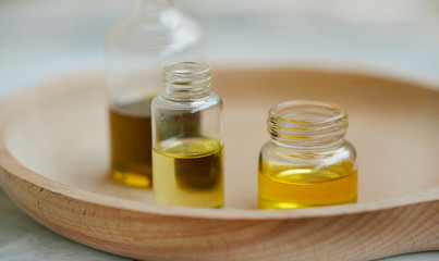 Aromatherapy. Natural medicinal plants and herbs oil bottles, natural floral extracts and oils, natural oils, alternative medicine