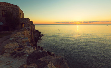 Dawn in the old medieval fortress of Monemvasia. Sea view. Monemvasia, Laconia, Peloponnese, Greece.