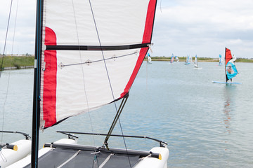 sailing club learning sailing boat and sailboards windsurf