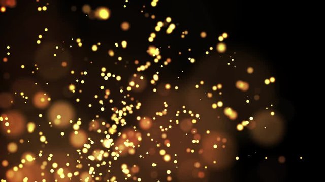 gold particles in liquid float and glisten. Background with glittering golden particles depth of field and bokeh. Luma matte to cut out glowing particles for holiday presentations. 4k 3d animation. 2