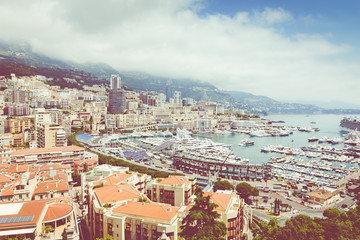 Fototapeta na wymiar La Condamine harbour. Cityscape and harbor of Monte Carlo. Principality of Monaco.