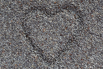close up of heart made in poppy seeds