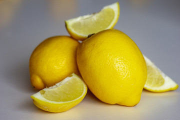 Freshly sun drenched lemons, on background Bokeh.