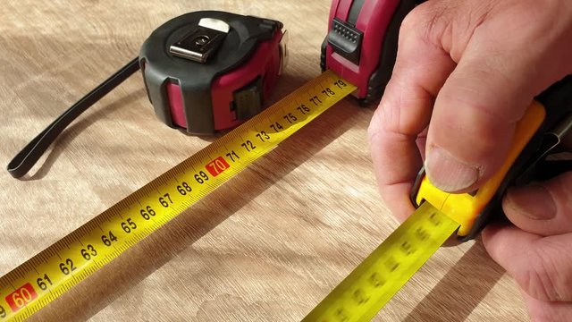 Measuring tape. Measuring centimeters. Construction tool.