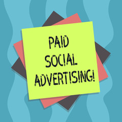 Conceptual hand writing showing Paid Social Advertising. Business photo text external marketing efforts involve a paid placement Multiple Layer of Sheets Color Paper Cardboard with Shadow
