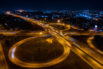 Fototapeta na wymiar interchange freeway high way motorway and ring road transportation logistics connect in the city with lighting the city background