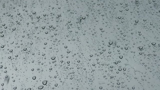 rain days, heavy rain falling on window surface.