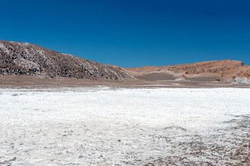The Moon Valley area (Valle de la Luna) of geological formation of stone and sand located in the...