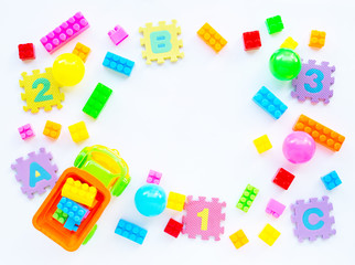 Colorful Kids toys on white background.