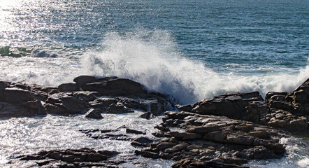 waves crashing on the rocks