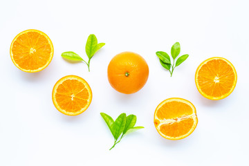 High vitamin C, Juicy and sweet. Fresh orange fruit with green leaves  on white