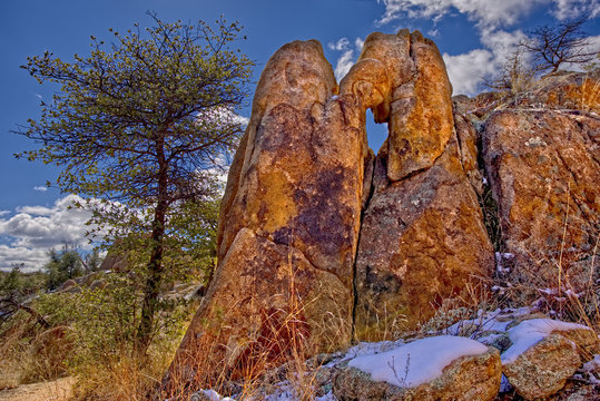 A granite rock formation along the Hole in the Wall Trail in Constellation Park in Prescott giving the trail its name, Arizona