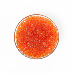Red caviar in glass bowl isolated on white background