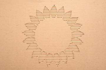   Flower cut out on a corrugated cardboard 