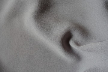 Spiral soft fold on grey crepe georgette fabric