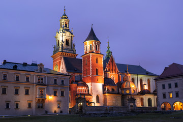 Fototapeta na wymiar Night view of the cathedral of Saints Stanislaw and Vaclav in Royal Castle on the Wawel Hill, Krakow, Poland