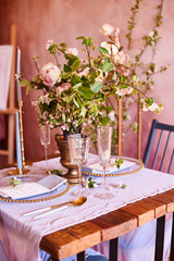 Vintage wedding decor. Beautiful event venue. Creative decoration. Pink and gold color. Wedding calligraphy menu