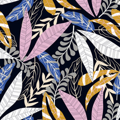 Trend seamless pattern with bright tropical leaves and flowers on black background. Vector design. Jungle print. Textiles and printing. Floral background.