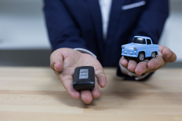 Business concept, car insurance, sell and buy car, car financing, car key for Vehicle Sales Agreement.
