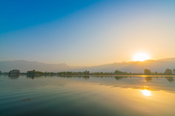 Sunrise on Dal lake, Kashmir India .