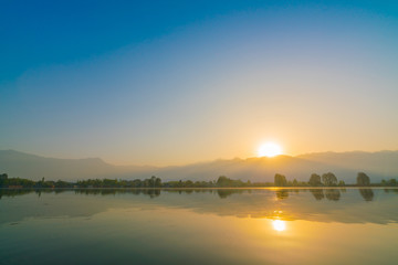 Fototapeta premium Sunrise on Dal lake, Kashmir India .