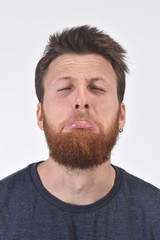 Obraz premium man grimacing on white background