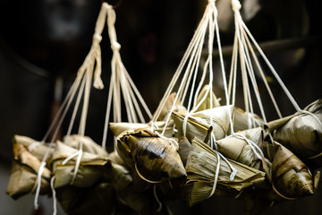 Zongzi, or in Thai name is Bajang,It is a sticky rice dumpling wrapped in banana leaves in a pyramidal shape.
