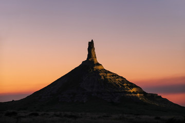 Chimney Rock National Historic Site illuminated at night, western Nebraska, USA